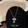 Colar com Pingente de Borla e Laço Luxo Leve Design de Nicho Elegante Versátil Doce Pingente de Zircônia Corrente Exquisita para Clavícula de Deusa