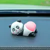 Adornos para coche en línea rojo caricatura lindo Q juego trasero muñeca consola central del coche juguete de descompresión decoraciones de animales