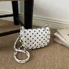 Bolso de alta gama para mujer 2026 verano nuevo bolso de axila para el trabajo diseño de nicho simple y moderno bolso de hombro cruzado