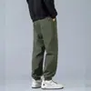 Nueva ropa ins para hombre para otoño e invierno, nuevos pantalones ligeramente anchos y fluidos que estilizan, pantalones deportivos rectos holgados para hombres de talla grande