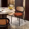 Silla de comedor de ratán de imitación nórdica para uso doméstico, estilo vintage de lujo ligero, popular en comunidades en línea, adecuada para restaurantes de alquiler vacacional, respaldo de ratán tejido retro, silla de hotel estilo americano