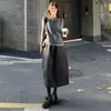 Saia de lã cinza tipo botão para mulheres, novo estilo outono/inverno 2026, cintura alta, saia evasê bolha emagrecedora, saia curta para baixinhas
