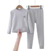 2026 Conjunto de ropa interior térmica de algodón de color AB, sin costuras y engrosado para niños y niñas, tops y pantalones de otoño, ropa para el hogar, pijamas