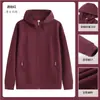 Sudadera con capucha y cremallera de retazos estilo urbano para hombre y mujer, chaqueta de color liso de corte holgado, ropa de trabajo de otoño e invierno hecha a medida, hecha a medida para parejas