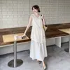 Verão 2026 Nova Moda Casual Rejuvenescedor Emagrecedor Simples Atmosférico Sem Mangas Saída de Praia Falso Duas Peças Vestido Tendência