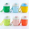 Nuevo vaso de agua color macarrón con asa portátil, vaso de vidrio, a prueba de fugas, alto valor estético, elegante vaso con pajilla