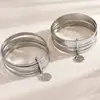 Pulsera Colgante Retrato de Reina Multicapa Europeo y Americano, Pulsera Abierta de Metal Dorado con Patrón de Ola en Relieve, Juego de 7 Piezas al por Mayor