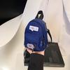 Mini bolsa pequena infantil, nova chegada da primavera de 2025, bolsa de ombro de lona com letras no peito, bolsa transversal moderna para meninas