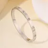 Pulsera Clásica de Acero de Titanio para Mujer Bestseller Transfronterizo de Amazon Pulsera de Lujo Ligero de Moda Regalo para Mejor Amiga Pulsera de Oro con Diez Diamantes