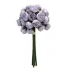 Explosiones de Celebridades de Internet 27 Flores Artificiales de Camelia Rosa Té Flores Falsas Lulian Sosteniendo Flores Decoración del Hogar Boda Accesorios para Fotos