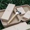 Tinta de Soja Sin Plástico Caja de Cartón de Papel de Caña de Azúcar Artículos de Tocador Desechables para Hotel Cepillo de Dientes de Bambú Set de Pasta de Dientes