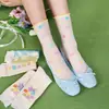 Calcetines finos de algodón para primavera y verano con pequeños lazos florales para mujer, calcetines de encaje hueco transpirables de tubo medio apilados estilo Miu dulce