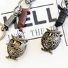 Personalidad creativa hecho a mano retro piel de vaca bronce búho llavero creativo pequeño regalo fábrica lote