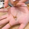 Tienda de oro Puzuo, mismo estilo, anillo de oro Sha Running, collar de flores de cuatro hojas, nicho de lujo ligero para mujer, cadena de lana de alta gama que combina con todo.