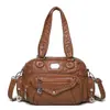 Nuevo bolso de hombro casual de cuero suave para comercio exterior transfronterizo, bolso tejido texturizado para mamá, bolso cruzado de diseño de alta gama, bolso de mano