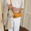Bolsa de mão tecida única para mulheres, novo modelo de verão 2026, bolsa de mão casual simples, bolsa transversal, bolsa de ombro de alto valor estético