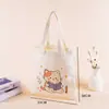 Bolsa de lona de dibujos animados en stock, bolsa de hombro alta personalizada, bolsa de algodón para compras y uso diario de estudiantes, logo personalizado