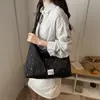 Bolsa de Lona com Bolinhas Estilo Coreano para Mulheres 2026 Nova Bolsa Tote de Grande Capacidade Estilo Universitário para o Dia a Dia Bolsa de Ombro Versátil Casual