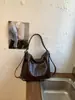 Nueva bolsa de estudiante de gran capacidad para mujer, versátil y texturizada, bolso de un solo hombro bajo el brazo, bolso de mano de cuero suave de moda