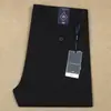 Calça casual de negócios masculina de fibra de poliéster elástica de lã fina com cintura reta de liocel, macia e confortável, para primavera e verão