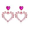 Pendientes de aleación hueca con forma de corazón de diamantes, con personalidad europea y americana, color brillante, con diamantes de imitación, para mujer.