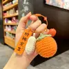 Colgante de peluche tejido a crochet cosas buenas suceden lana tejida a mano Caqui bueno Caqui suceden llavero para bolso accesorios pequeños