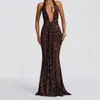 Vestido de otoño e invierno nuevo estilo europeo y americano con cuello halter y escote en V pronunciado con cintas, vestido ajustado sexy con estampado de leopardo, sin espalda y bodycon