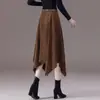 Falda de diseño irregular para mujer, nuevo estilo otoño 2026, talle alto retro, longitud media, fluida, estiliza y con dobladillo ancho