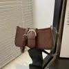 Bolsa Popular para Mujer de Comercio Exterior Versátil Bolso de Hombro 2026 Verano Bolso de Mano Sencillo Textura de Color Sólido Elegante Bolso de Hombro Único de PU