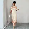 2026 Nuevo Vestido Camisa Vintage Europeo y Americano de Retazos Florales Naranjas con Cuello de Solapa, Mangas Cortas, Ceñido a la Cintura, Falda Larga Plisada