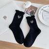 Meias femininas absorventes de suor de outono e inverno Bonito Cartoon Olhos grandes Meias de tubo médio Meias de estilo japonês Cinza desossado Lace empilhado