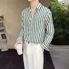 Camisa de manga larga a rayas para primavera y otoño, moderna y elegante para hombre, con un ambiente fresco y artístico, casual y cómoda, estilo japonés, y que irradia un aura relajada y elegante.