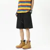 Shorts casuais azuis-marinho com corte enviesado estilo americano para homens, calças de seda gelada de secagem rápida para o verão com um toque jovem e corte solto