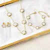 Nova Moda Pulseira de Trevo de Cinco Folhas Flor da Sorte 18K Popular Nicho Versátil Dupla Face Madrepérola Flor de Ameixa Empilhável Joias