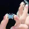 Anillo de apertura de esmalte con gotas de aceite de mariposa azul, estilo de chica dulce con sabor a especias, diseño con personalidad, moda y combina con todo.