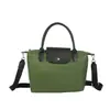 Bolso de mano, diseño minimalista de bloques de color, tejido de nailon, bolso de estilo alargado, retro urbano, moda nicho, bolso de hombro texturizado