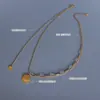 Marca French Gear Collar con Borla de Letra Acero de Titanio Chapado en Oro Verdadero 18K P1037