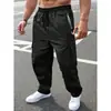 Pantalones casuales de trabajo para hombre, de color liso, sencillos y versátiles, con cordón y bolsillos, adecuados para primavera y otoño, disponibles en stock para comercio internacional