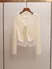 Shenzhen Nanyou Ropa de Mujer de Gama Alta Primavera Nueva Estilo Francés Estilo Chica Picante Hueco Ajustado Tejido Falso de Dos Piezas Top para Mujer