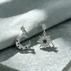 Brincos assimétricos de estrela e lua em prata de lei s925, estilo coreano, luxo leve, versáteis, design requintado, brincos cravejados de diamantes para mulheres