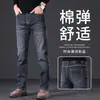 Jeans de invierno franceses para hombre, marca importada de alta gama, pantalones casuales versátiles de corte recto slim-fit para negocios, nuevo estilo 2026