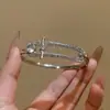 Pulsera de lujo con cielo estrellado dorado, moderna y elegante, sensación de alta gama, lujo ligero, nicho, versátil, joyería para mujer estilo europeo y americano