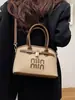 Bolsa Transversal de Ombro Único Versátil e Fashion para Mulheres 2026 Novo Modelo Bolsa de Mão de Design de Nicho de Alta Qualidade Bolsa Concha para o Dia a Dia