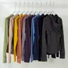Ropa nueva de yoga otoño e invierno popular para mujer chaqueta con capucha de color liso cárdigan con capucha casual para deportes running nocturno yoga