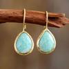 Pendientes colgantes de piedra Tianhe de alta gama, modernos y transfronterizos, de piedra natural, elegantes joyas de moda europea y americana.