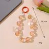 Cadena para teléfono de lazo translúcido fresca y delicada con cuentas, cadena colgante de perlas blancas, colgante de llavero creativo hecho a mano al por mayor