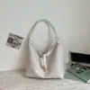 Bolsa de balde tecida casual de nicho estilo coreano, nova bolsa de ombro da moda de verão 2026, bolsa de ombro para o trabalho