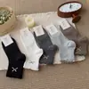 Meias novas de outono, estilo versátil, com nó de laço, cor sólida, até a panturrilha, meias femininas sem costura para uso casual