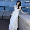 Vestido irregular estilo vacacional para mujer, nuevo modelo 2026, blanco, entallado en la cintura, vestido largo de verano