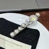 Pinza para el cabello de alta gama con forma de corazón de perla, pinza de pico de pato para flequillo lateral, pinza lateral de figura de ocho con pedrería para mujer